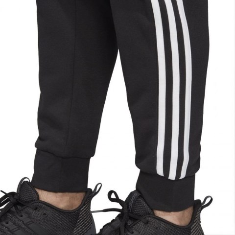 Spodnie adidas Essentials 3 Stripes Tapered Pant FT Cuffed M DU0468