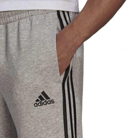 Spodnie adidas Essentials Tapered Cuff 3 Stripes M GK8976 M