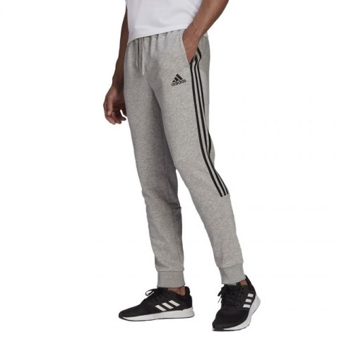 Spodnie adidas Essentials Tapered Cuff 3 Stripes M GK8976 M