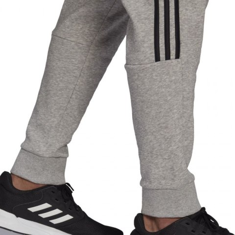 Spodnie adidas Essentials Tapered Cuff 3 Stripes M GK8976 M