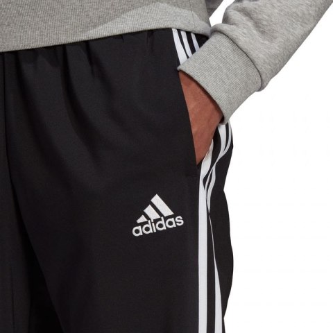 Spodnie adidas Essentials Tapered Cuff 3 Stripes M GK8980 2XL