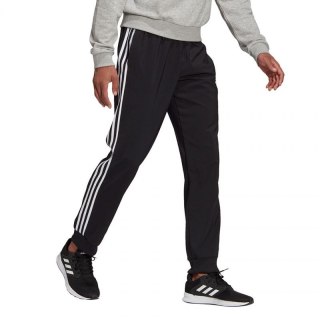 Spodnie adidas Essentials Tapered Cuff 3 Stripes M GK8980 L