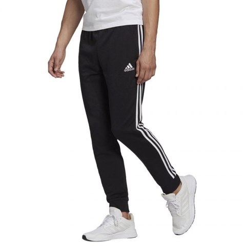 Spodnie adidas Essentials Tapered Cuff 3 Stripes M GK8831 XS