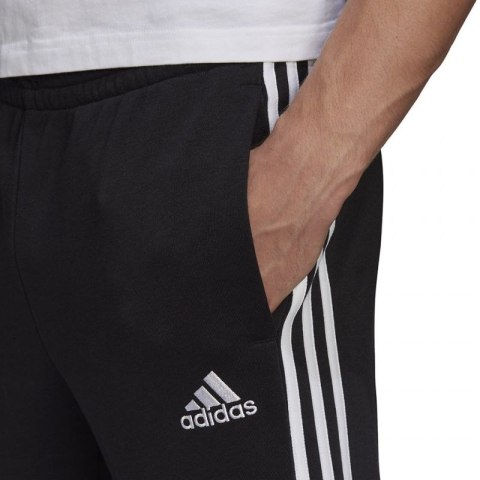 Spodnie adidas Essentials Tapered Cuff 3 Stripes M GK8831 XS